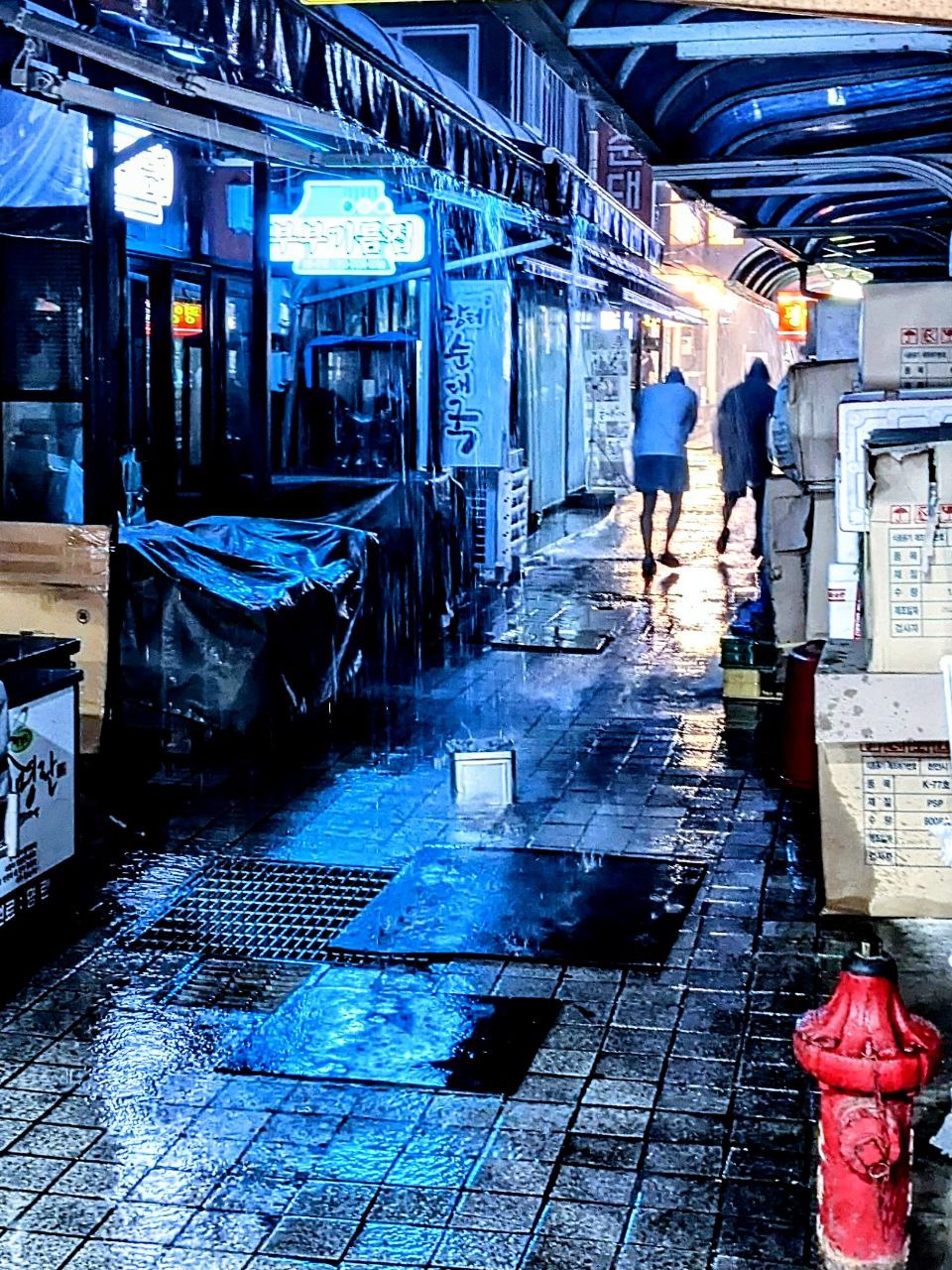 Market street under rain, South Korea